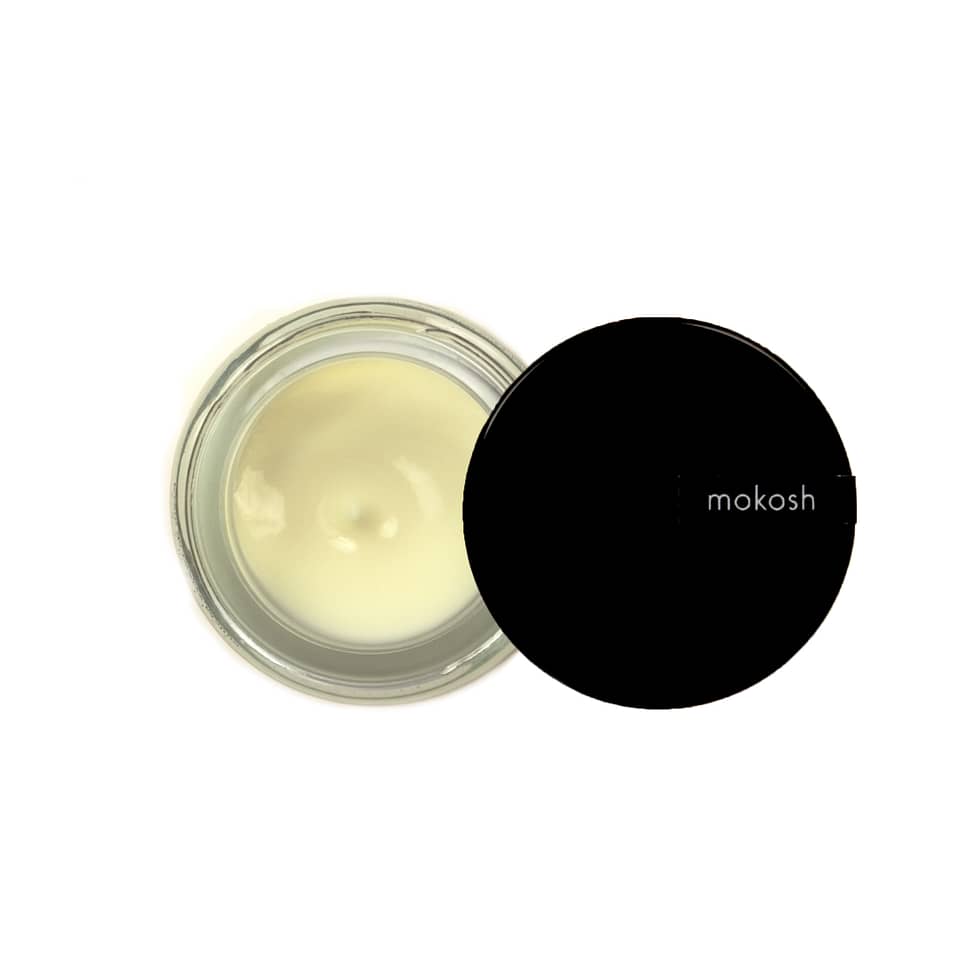Anti-pollution face cream in a small glass jar from Mokosh Cosmetics.