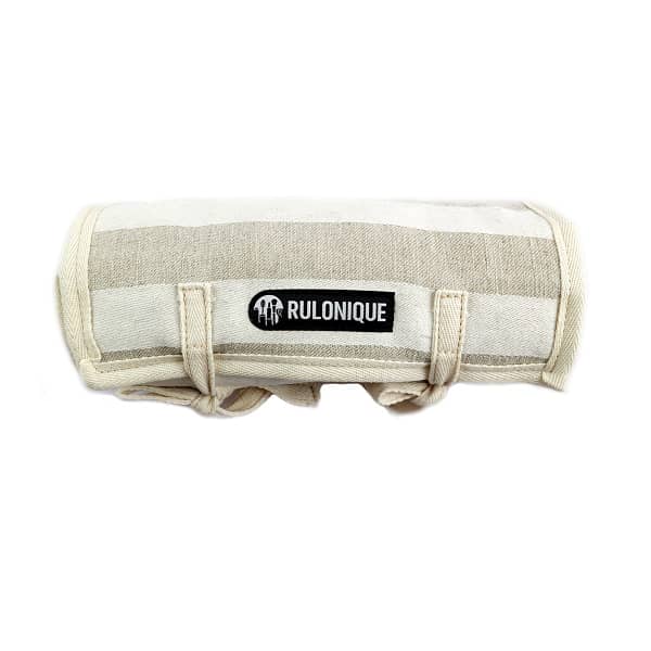 Linen roll up type cosmetic bag, captured in a rolled form with the logotype in front.