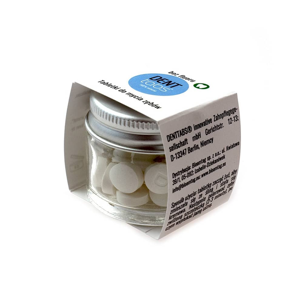 Denttabs toothpaste tablets with flouride in a glass jar. 28 tablets.